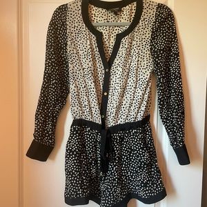 Juicy Couture romper size Small. Light silky material. Beautiful pattern/accents